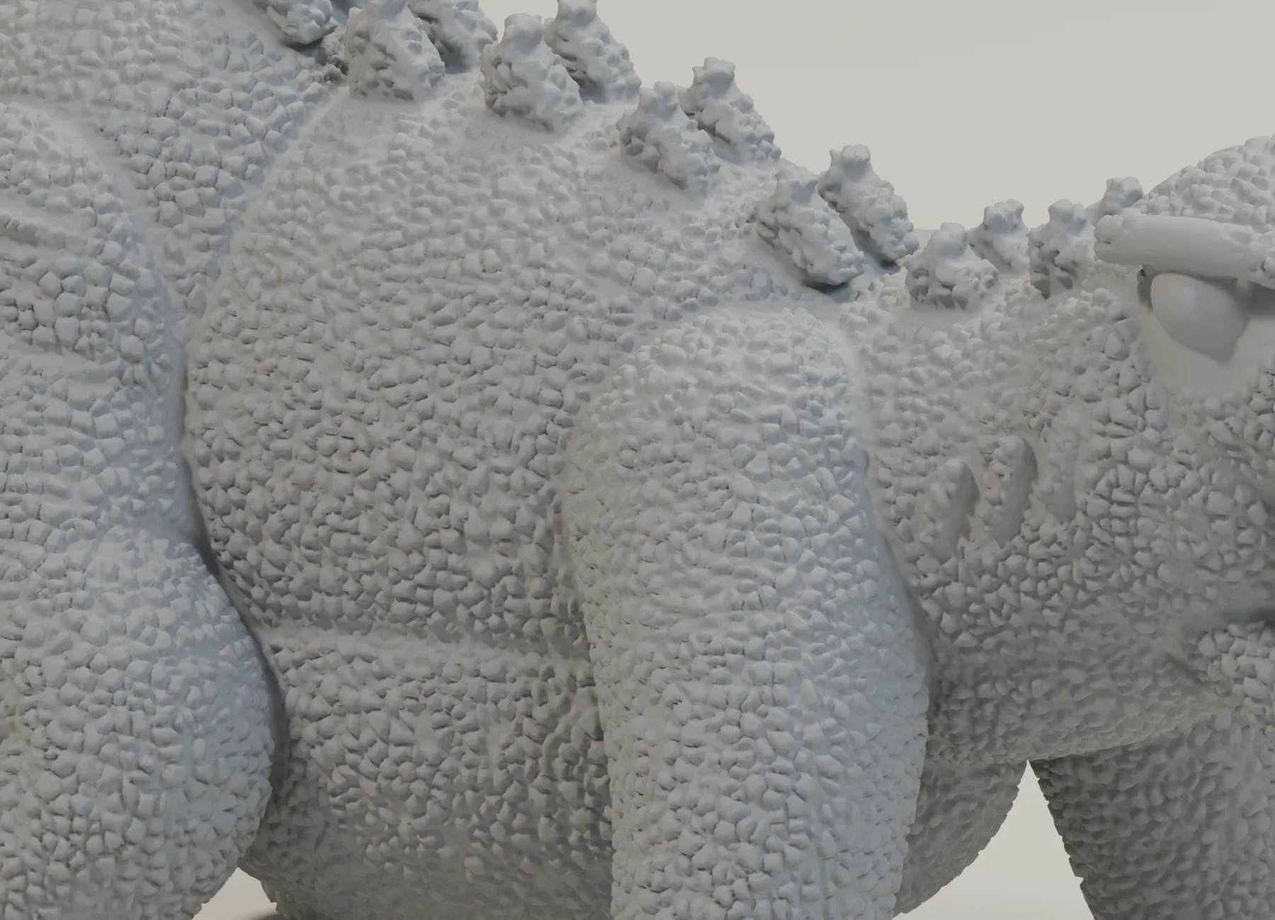 Neutral-grey Rauisuchus STL close-up with dense irregular pebbled skin, folds and rounded dorsal plates.